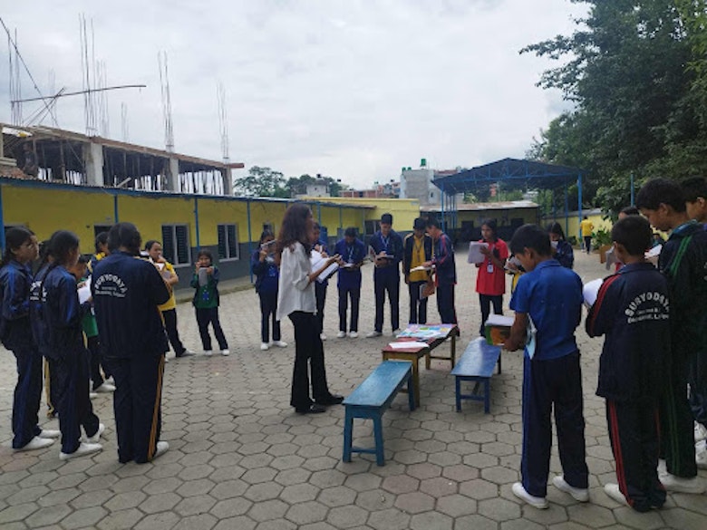 Ritu sensitising a children's club