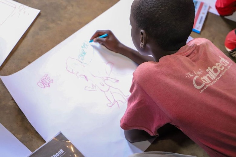 Child drawing during the SCROL sensitisation workshop