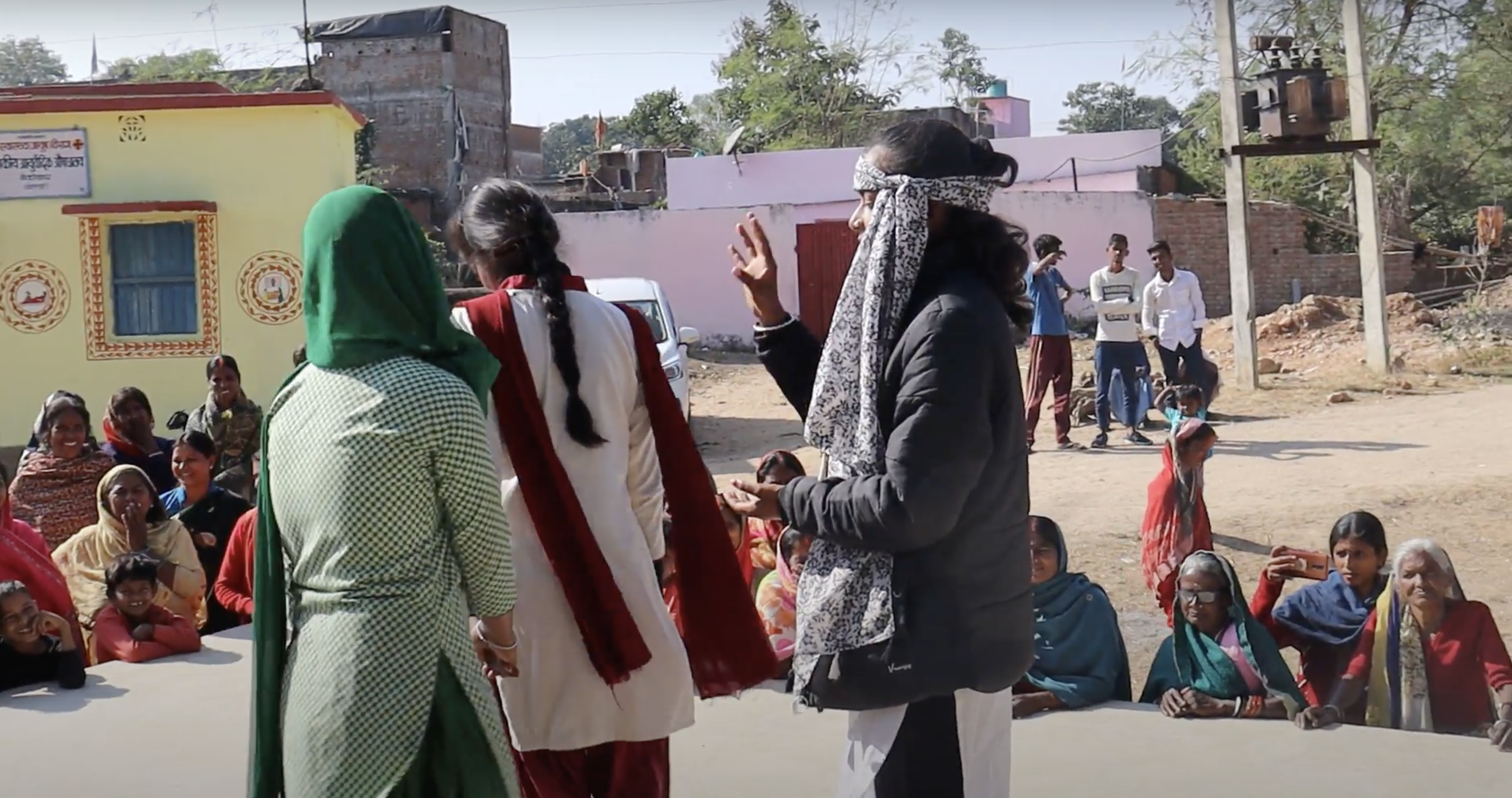 Children stage an awareness street play in their community