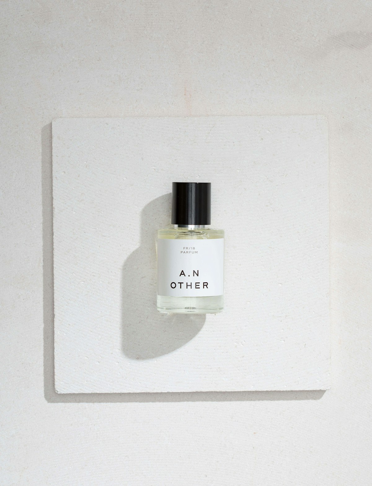 A bottle of perfume on a white background