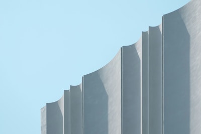 Gray concrete building during daytime.