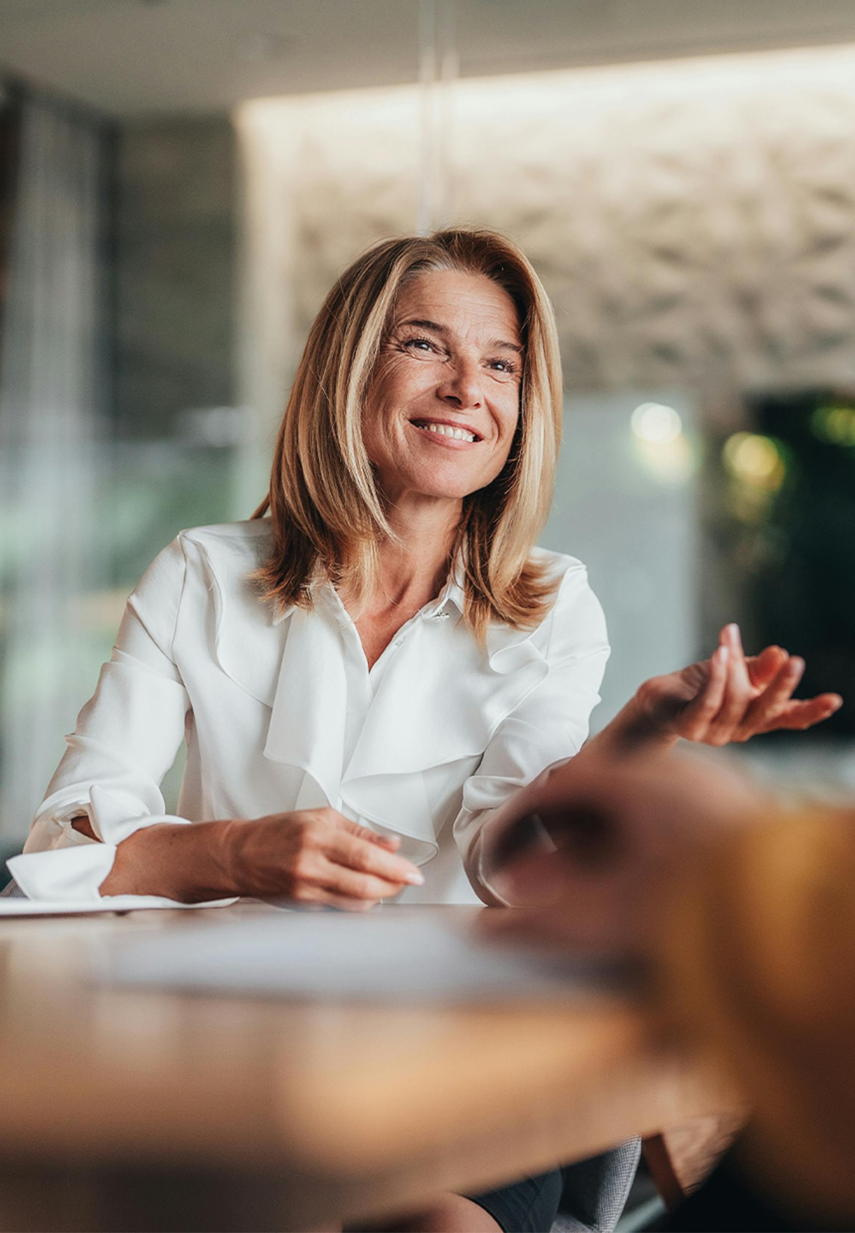 woman talking to another person