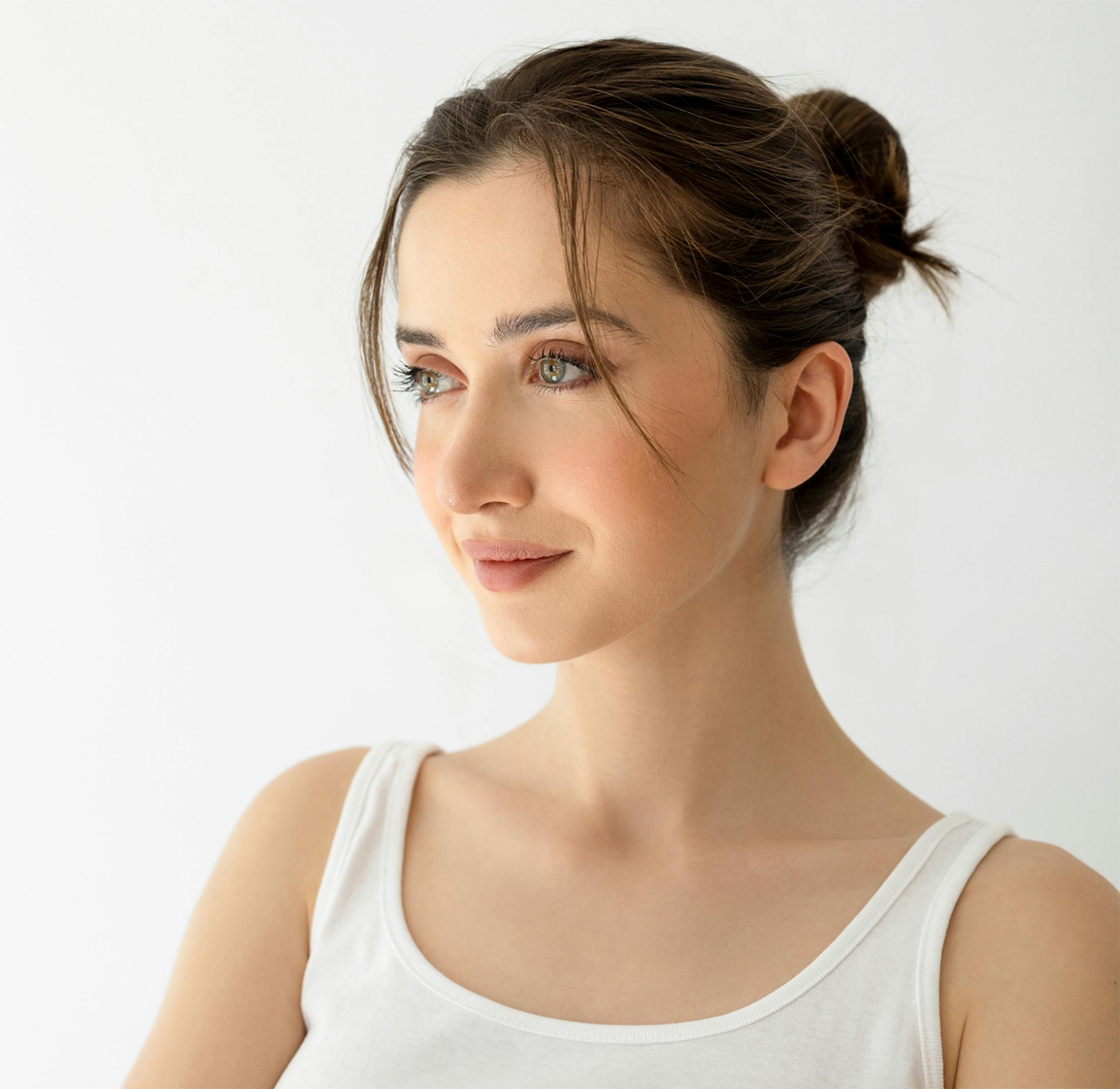 woman with her hair in a bun