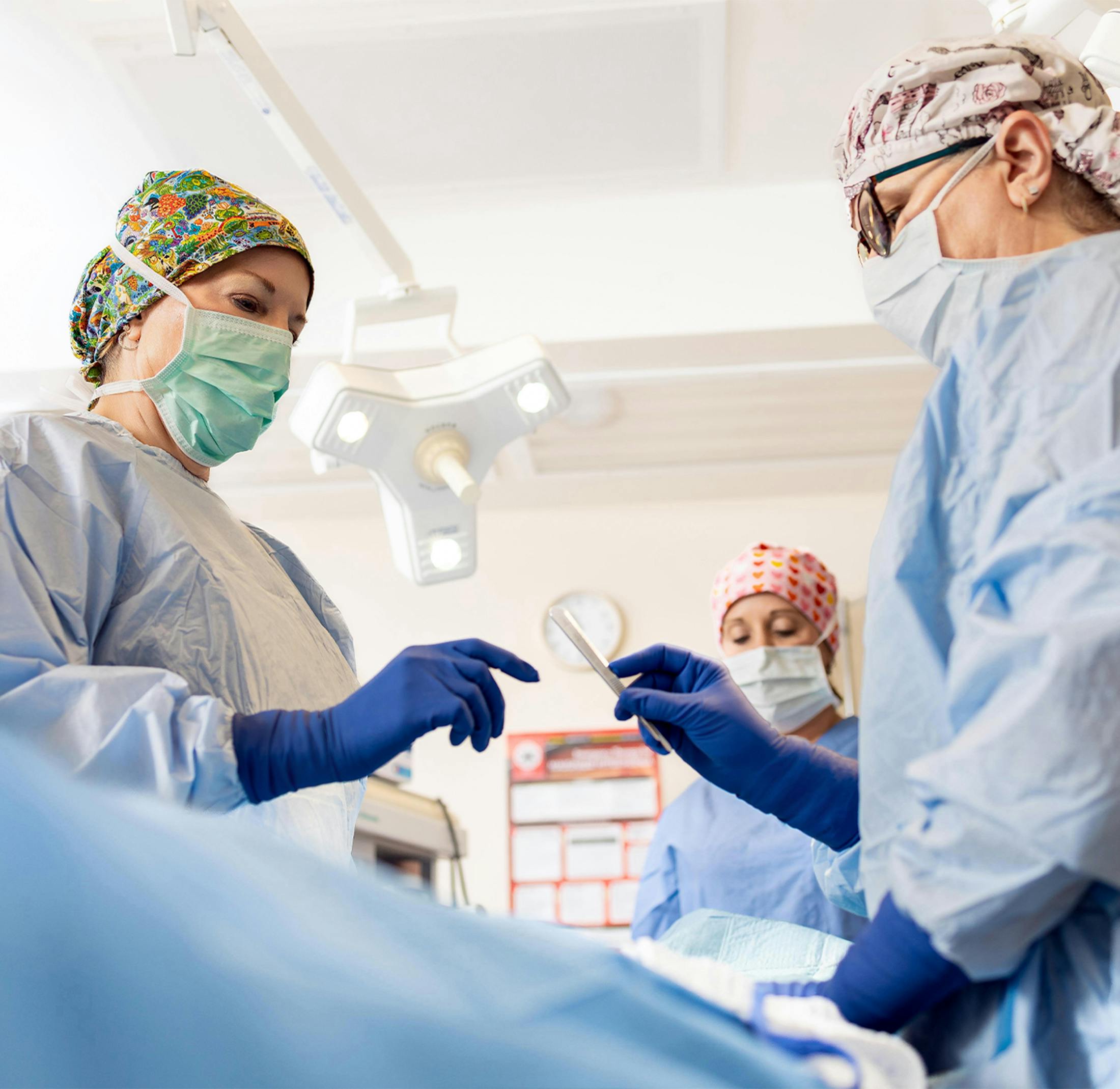 Dr. Sonya Merriman performing a procedure on a patient