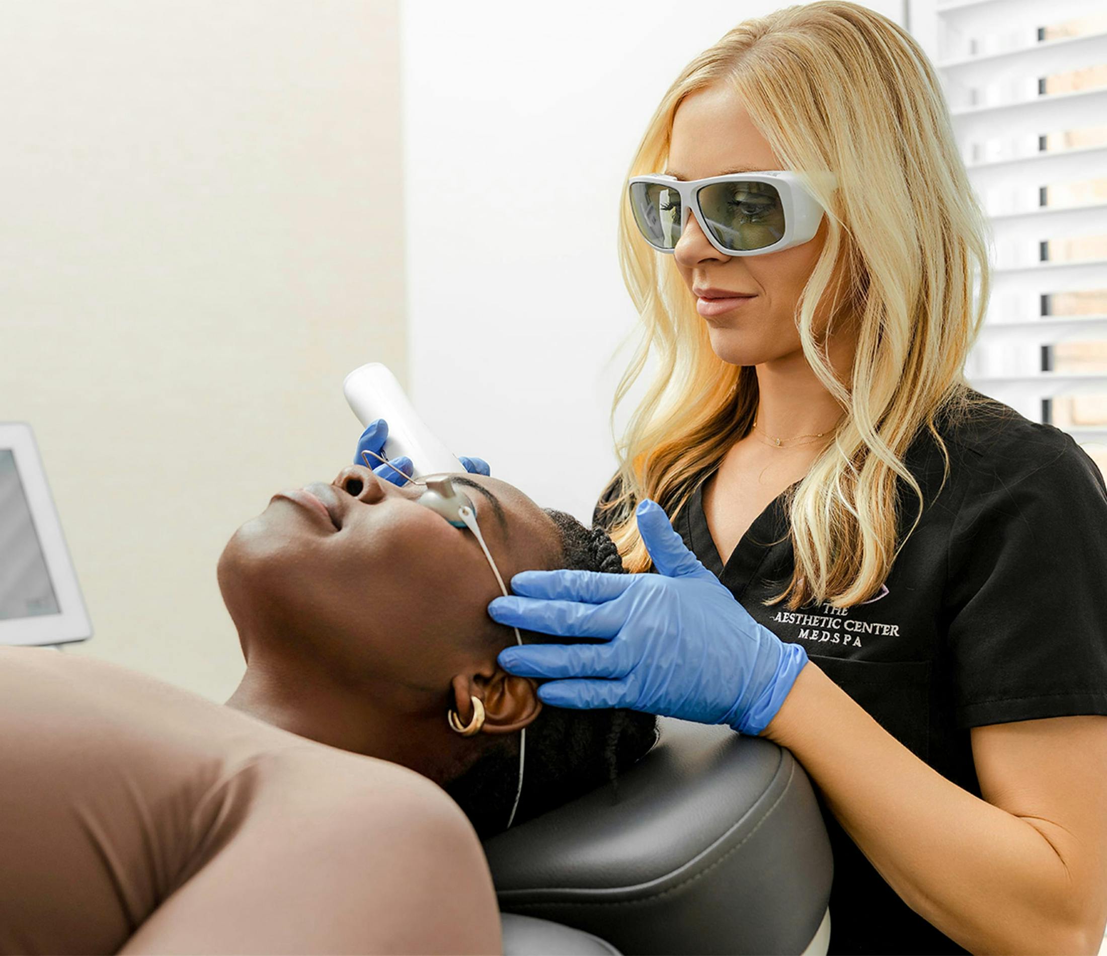 person getting a laser treatment