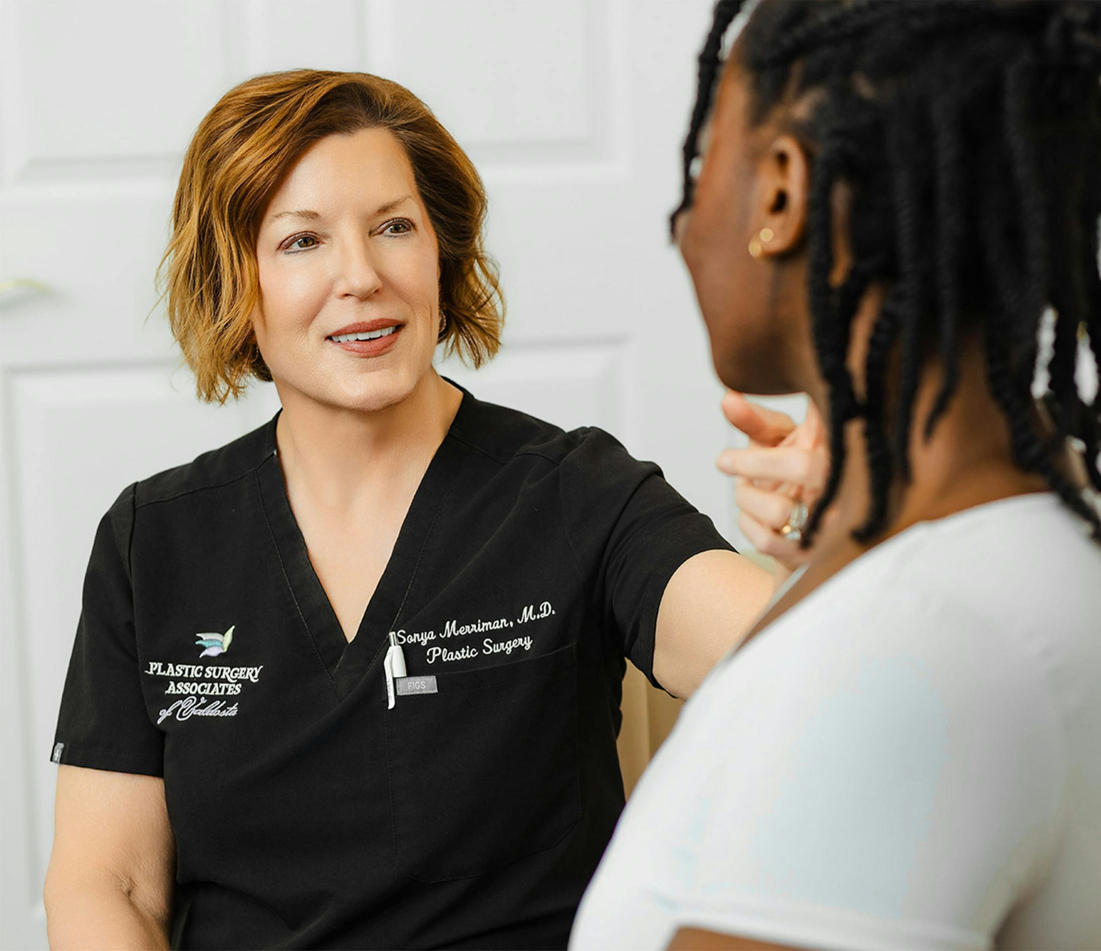 Dr. Sonya Merriman with a patient