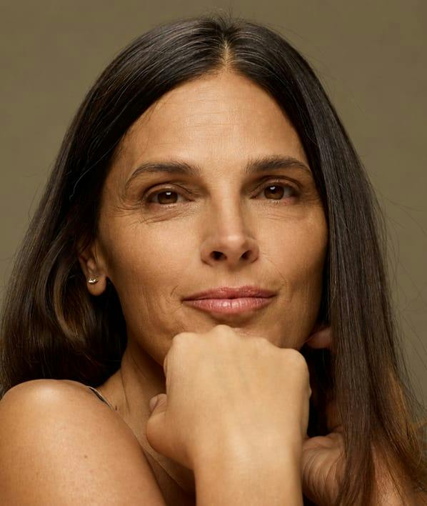 woman touching her chin