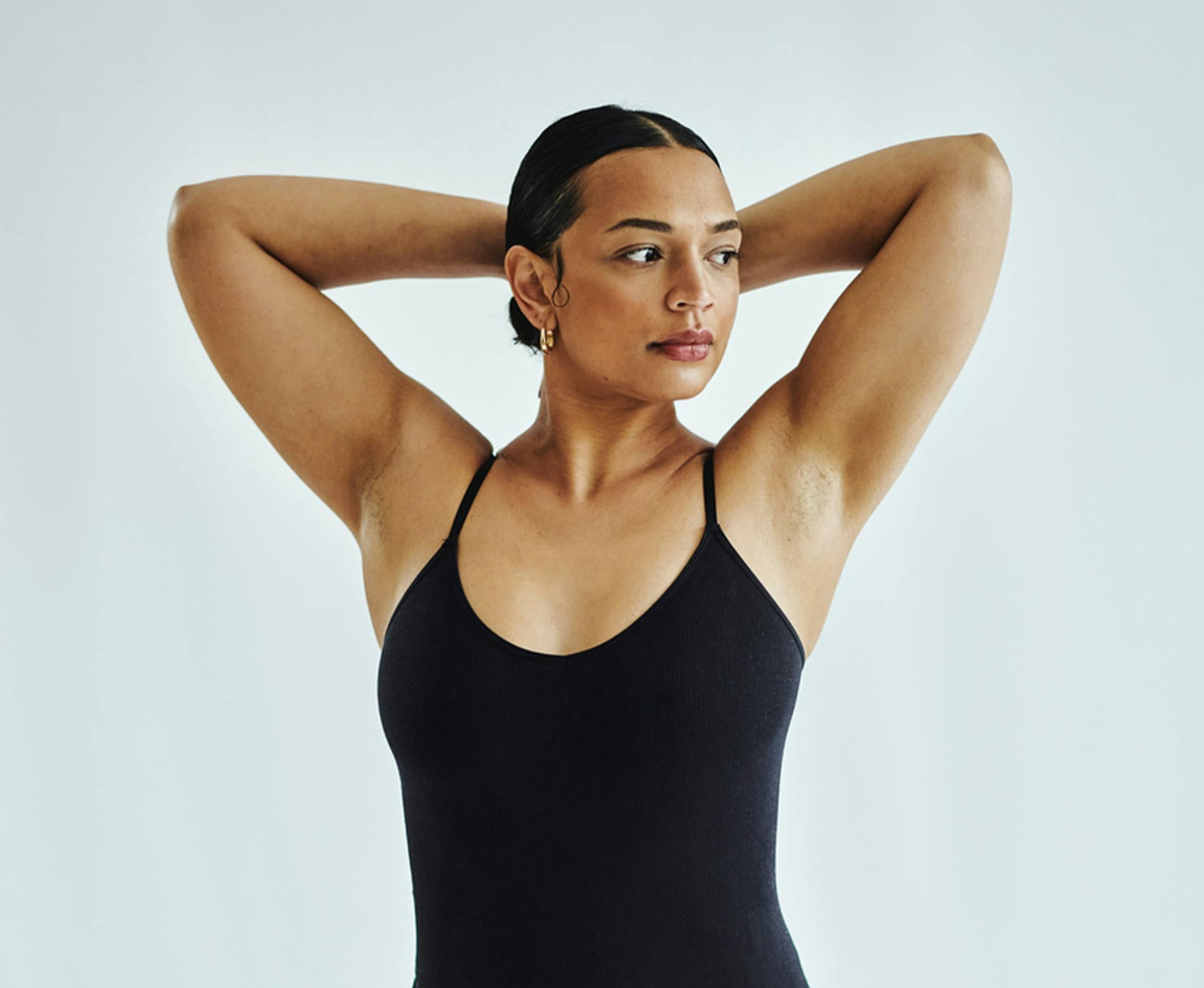 women raising her arms