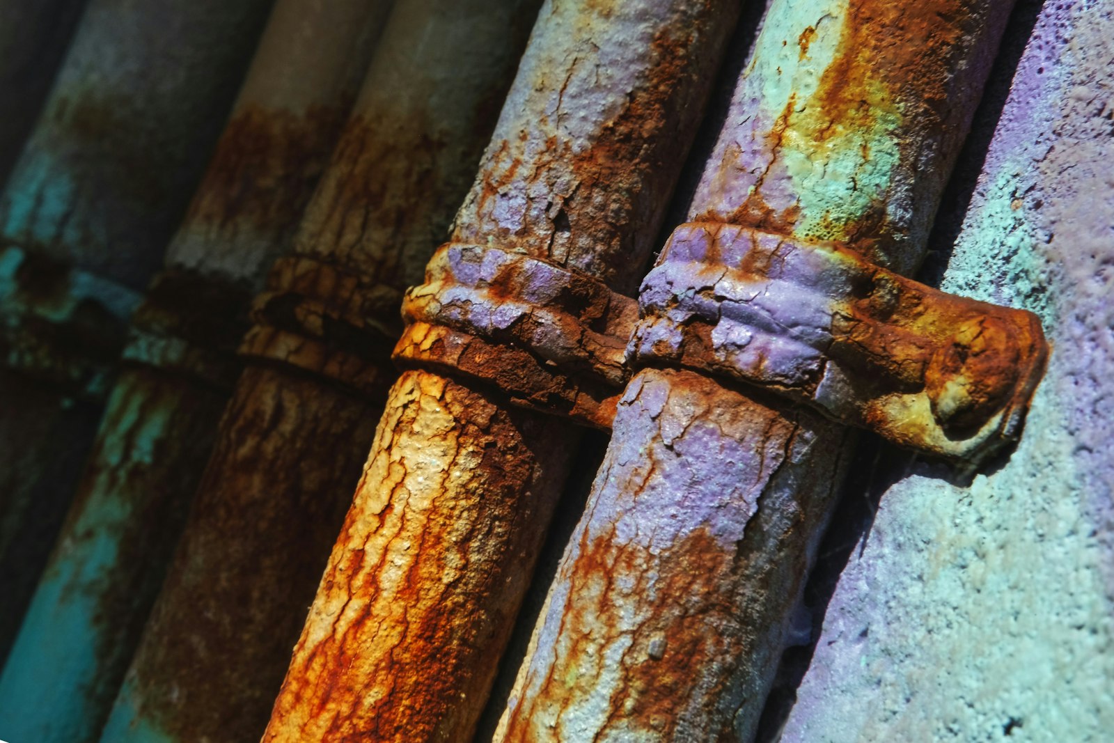 A row of rusted pipes.