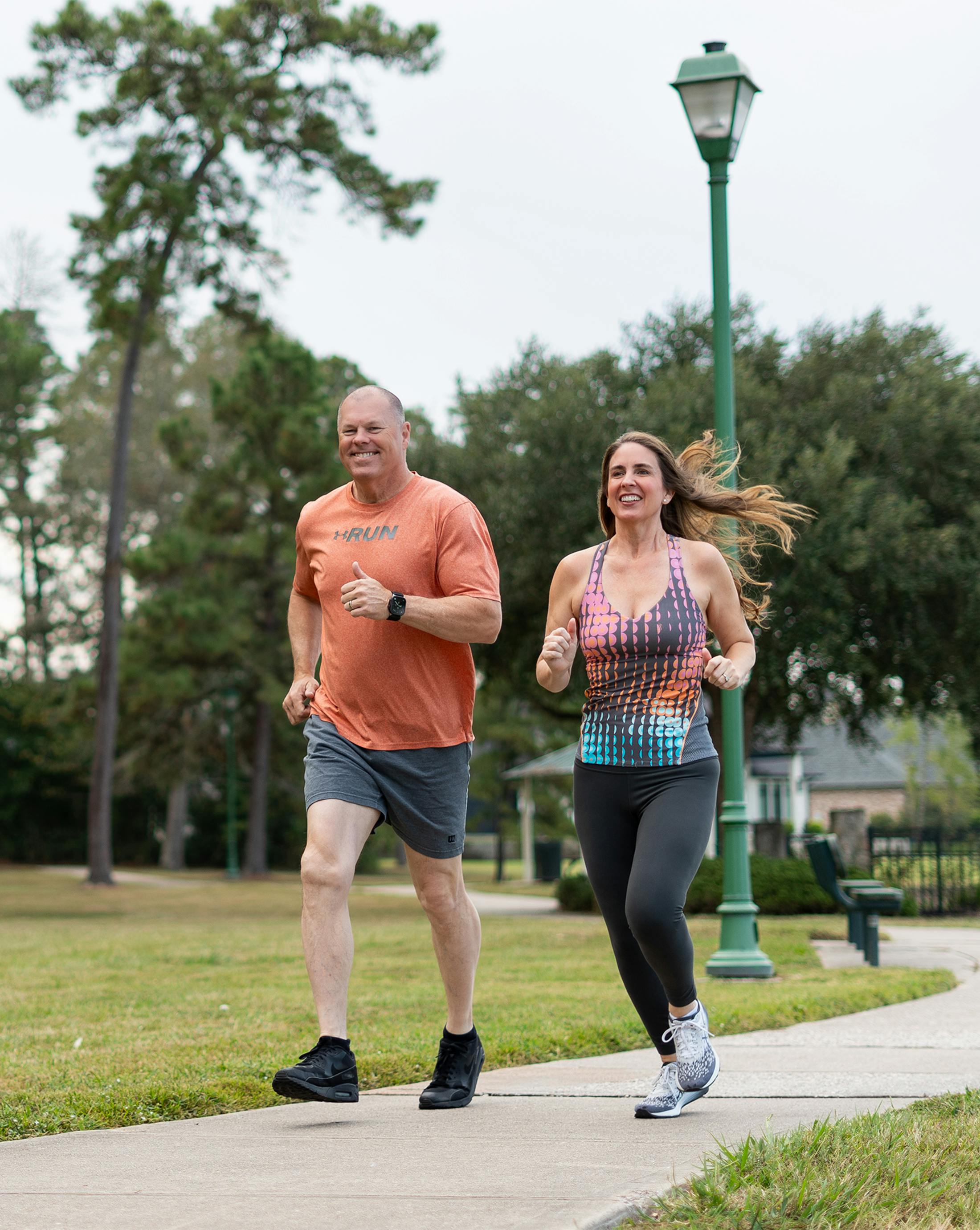 A man and woman running