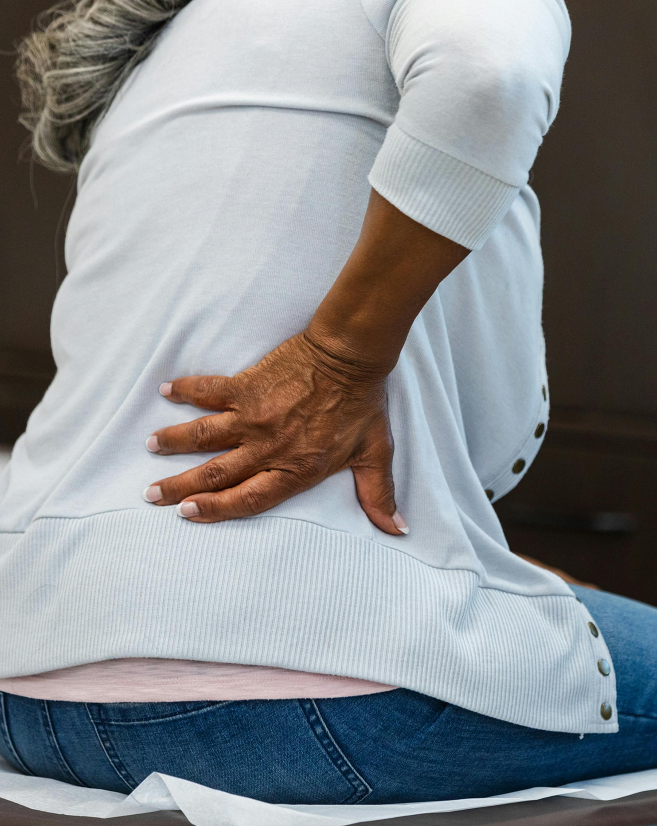 A woman holding her hip