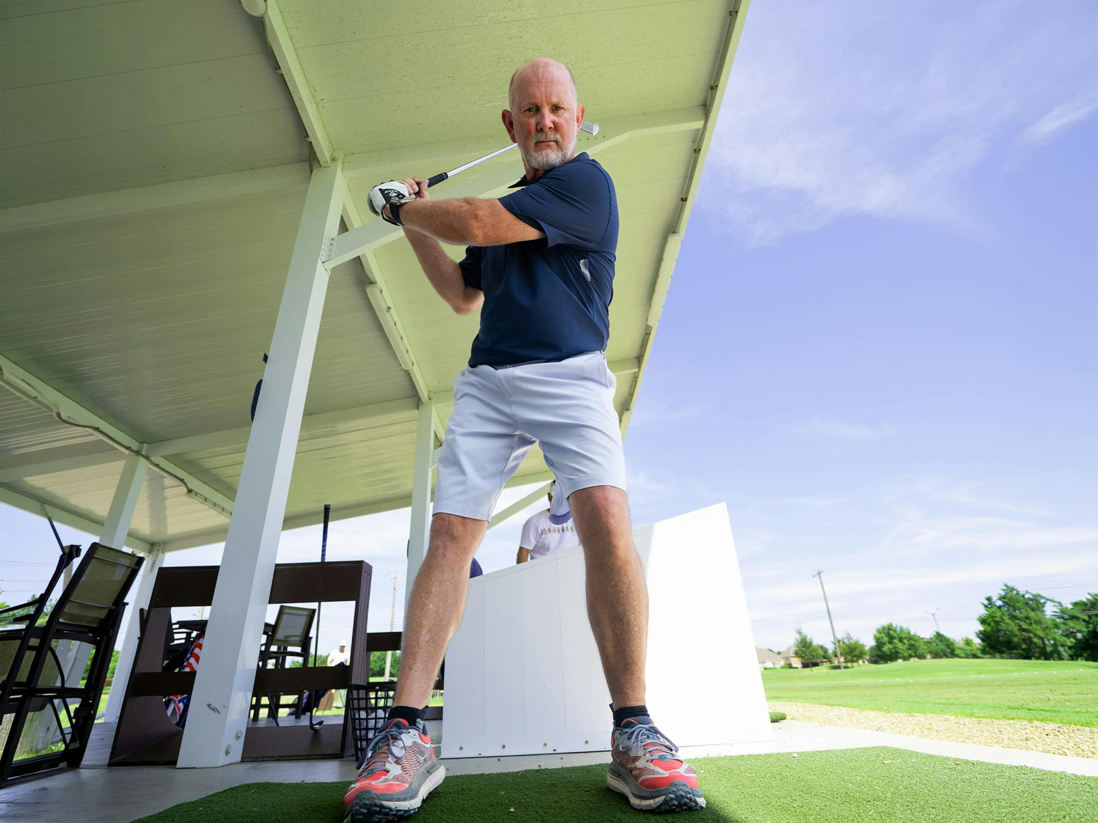 A man holding his hip