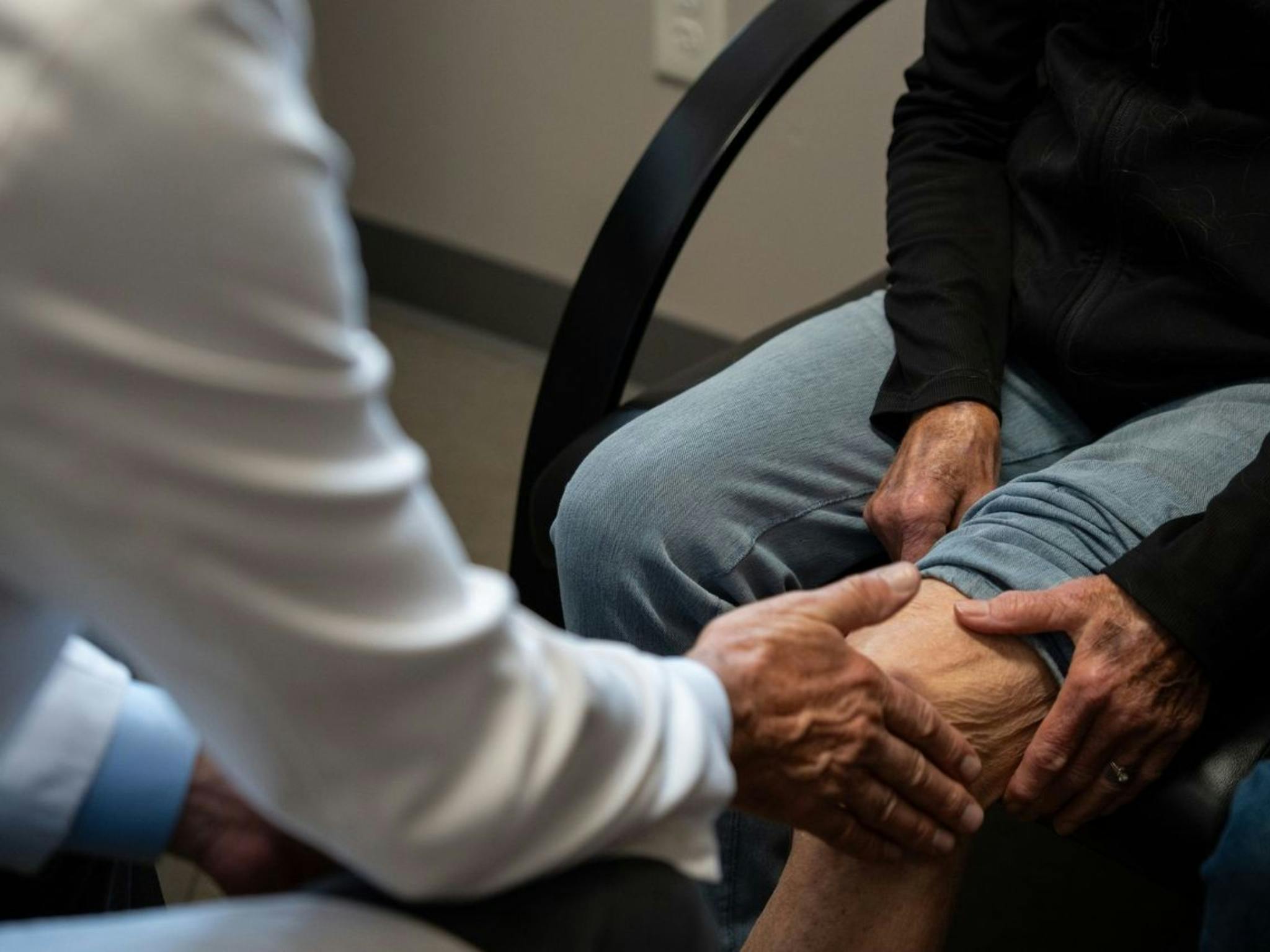 holding knee
