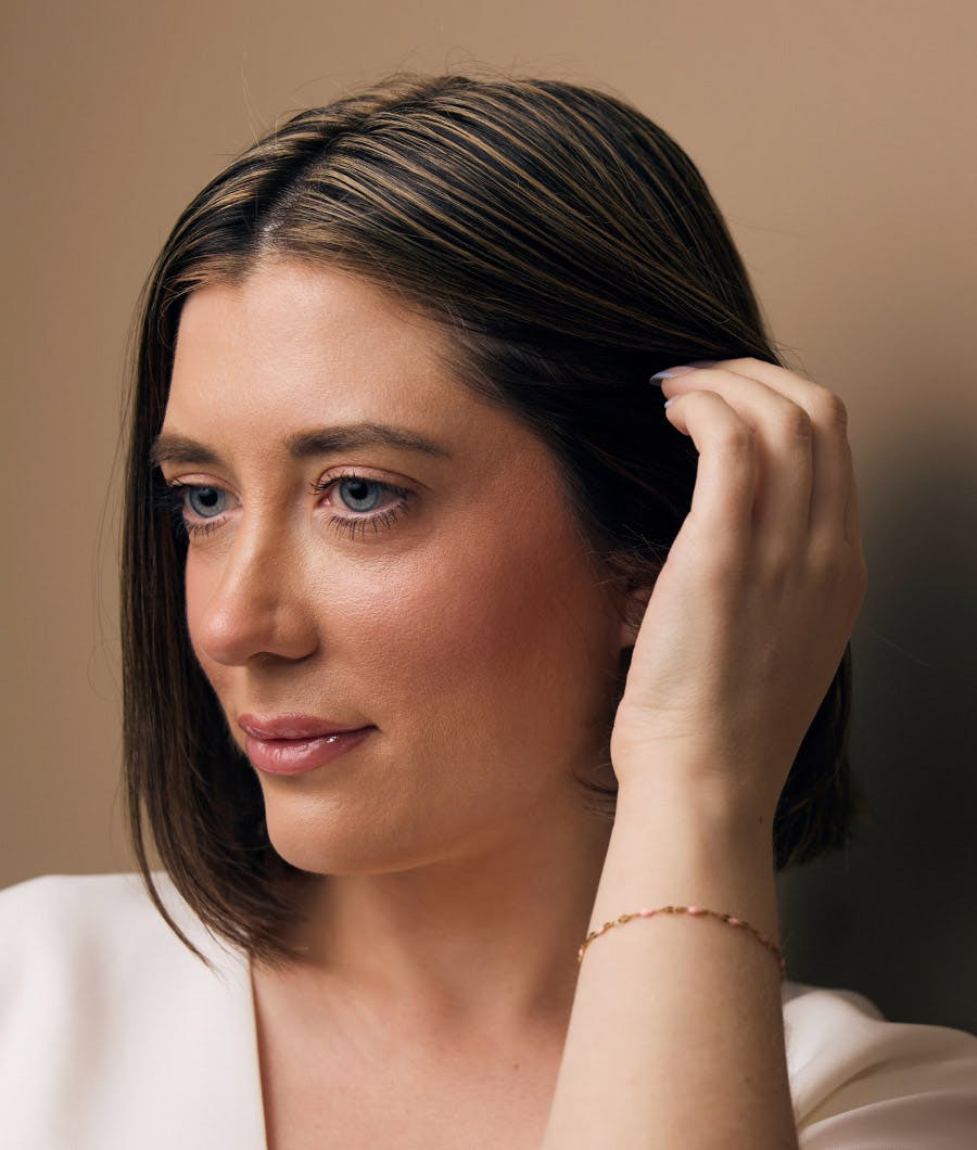 Woman touching her hair