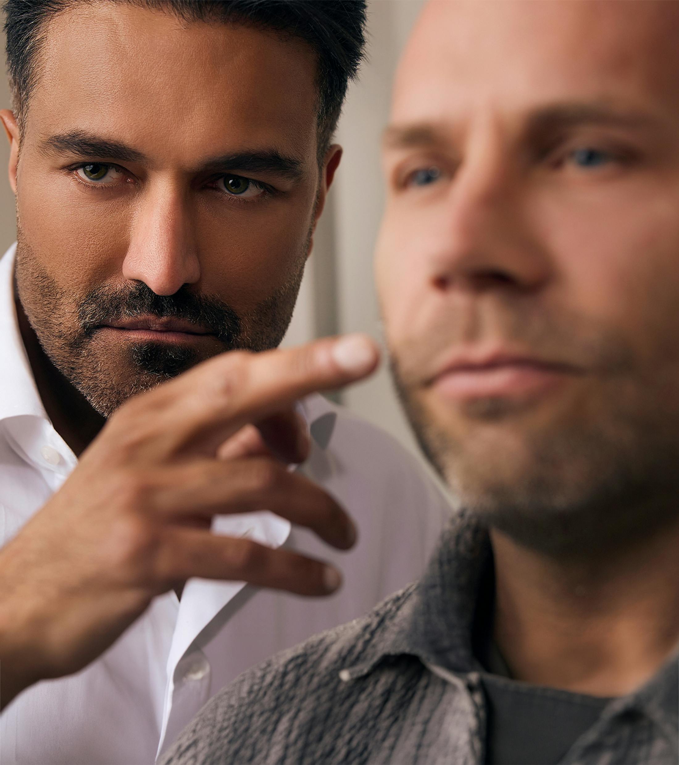 doctor pointing at a patient