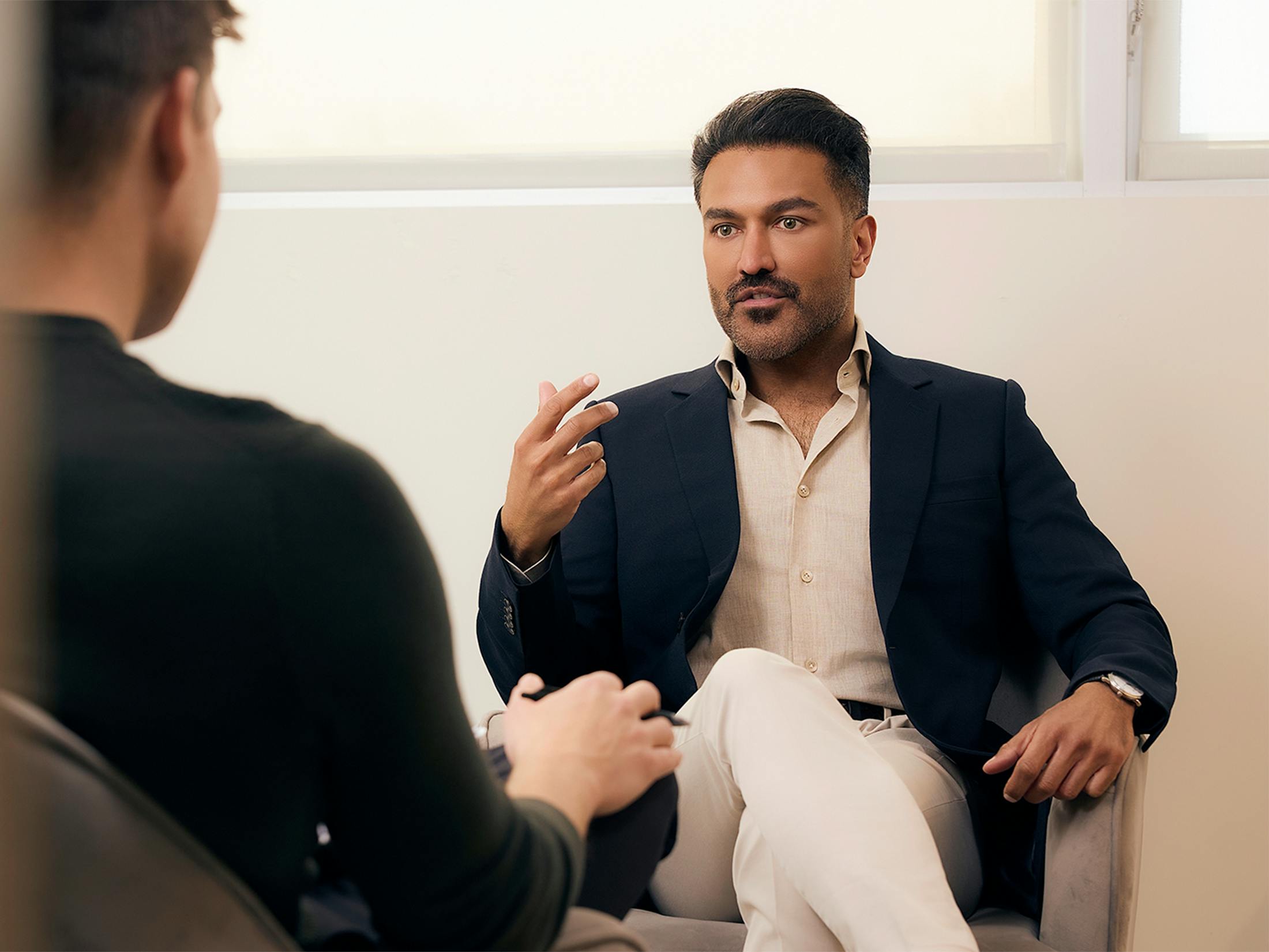 man talking to patient