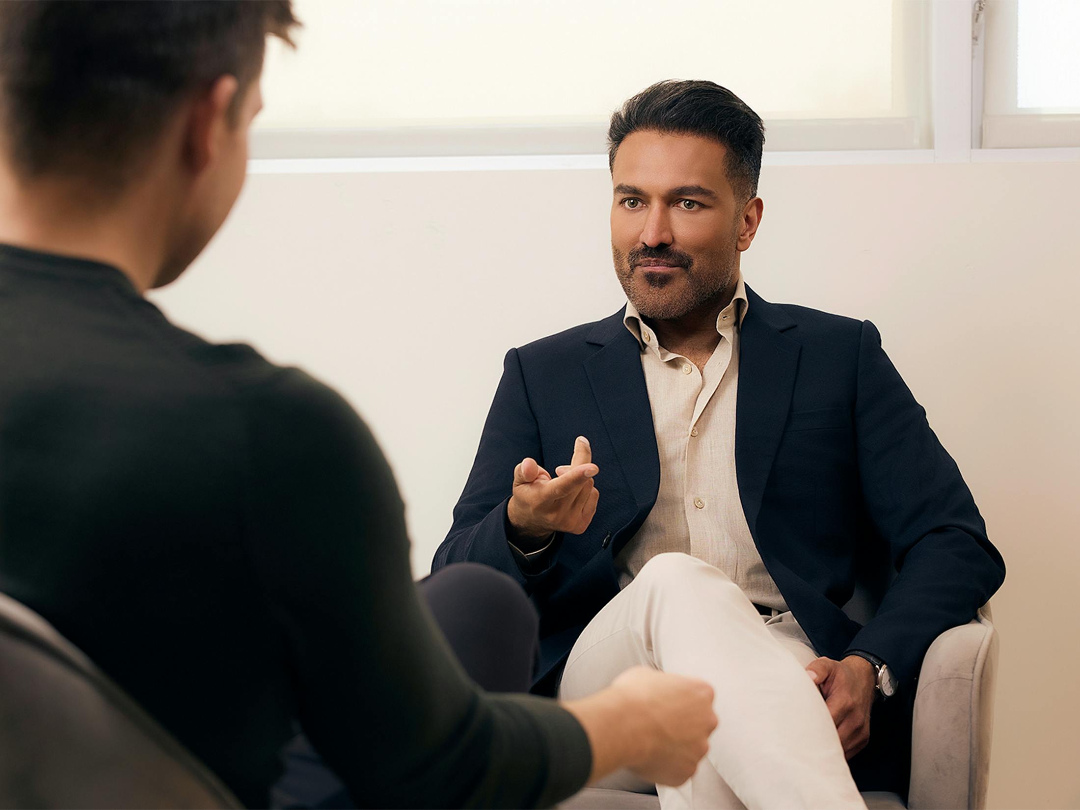 Two men talking