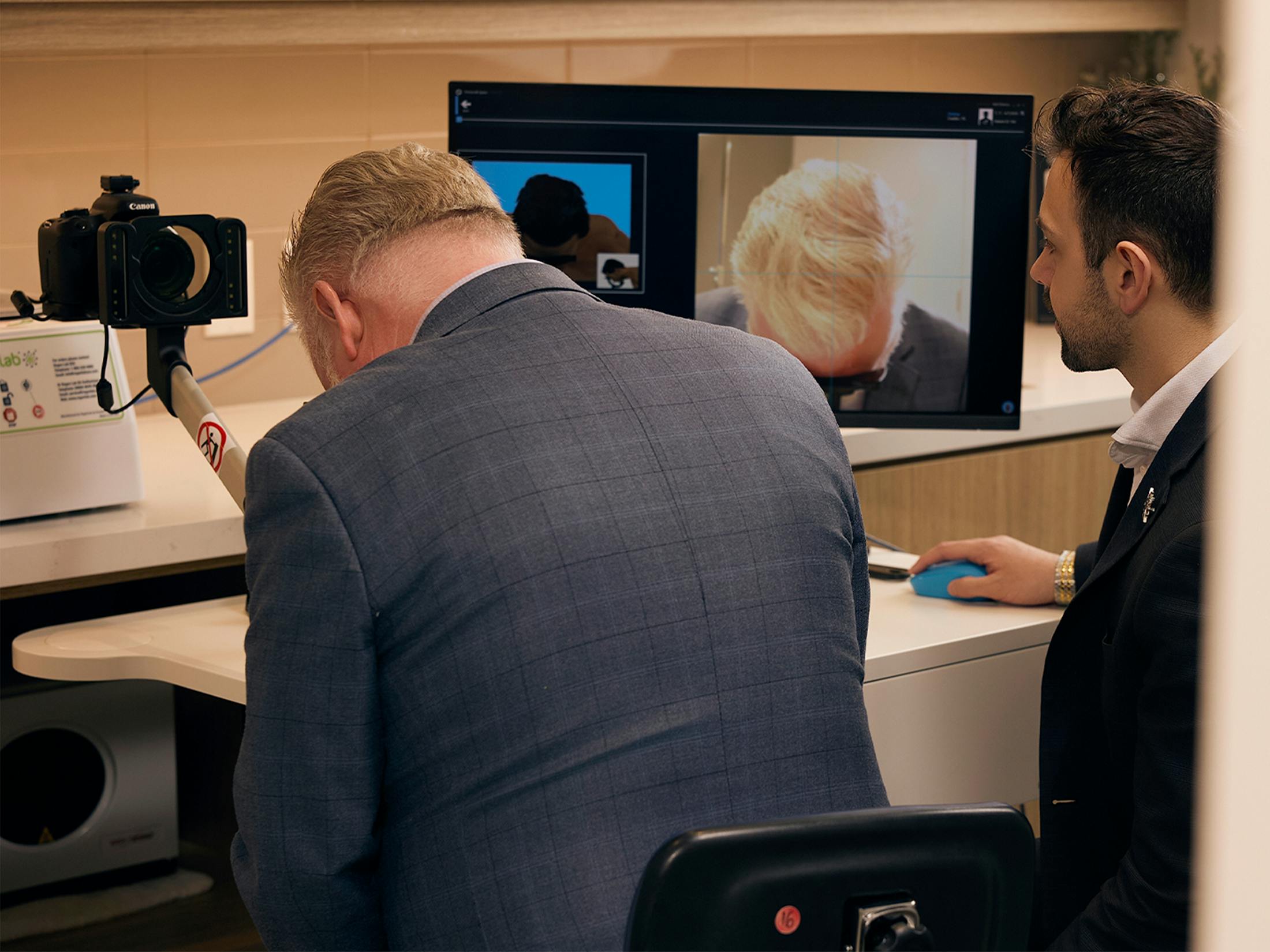 A man getting a photo taken of his hair