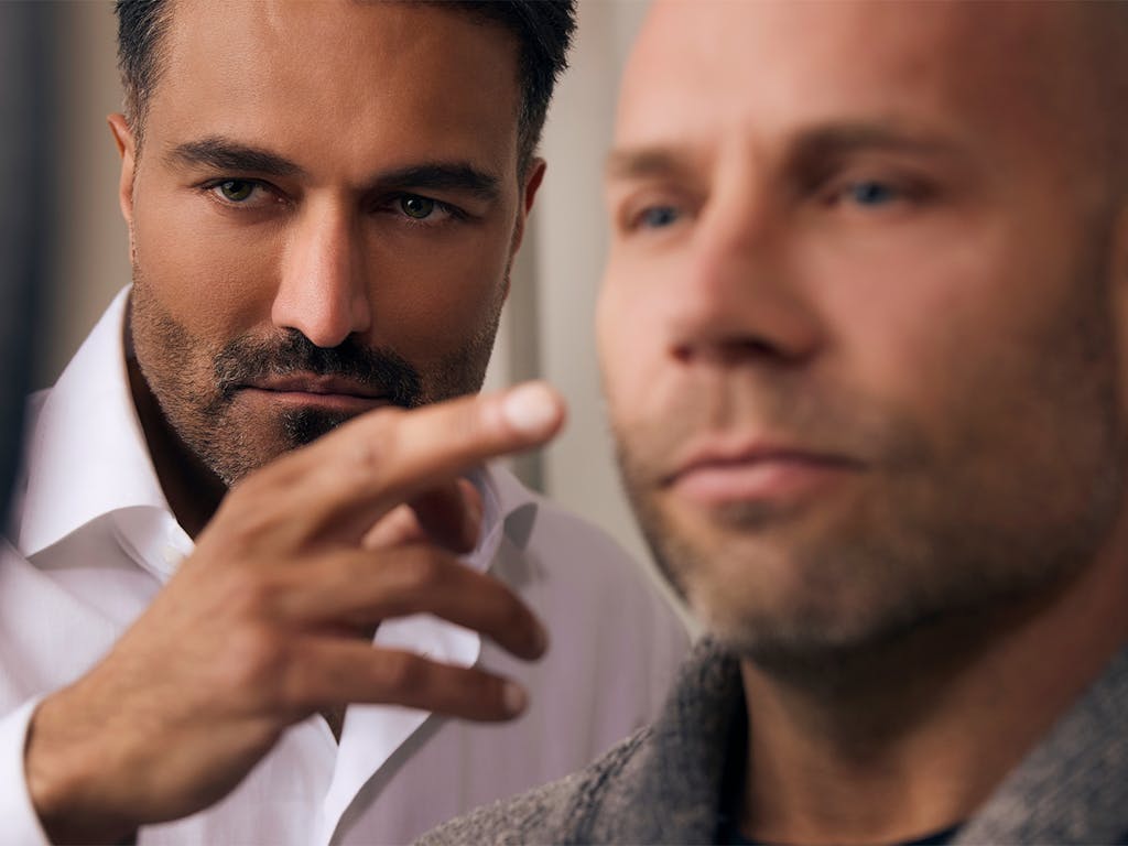 Doctor helping a patient