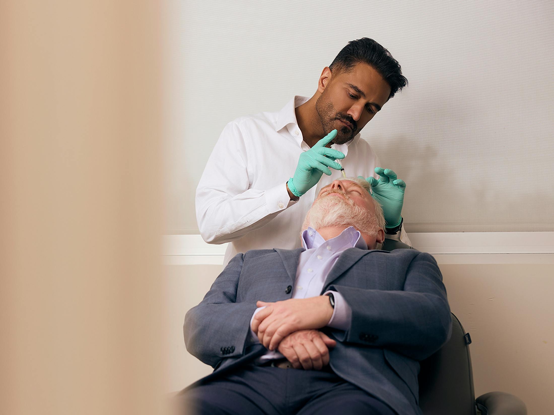 doctor helping a patient