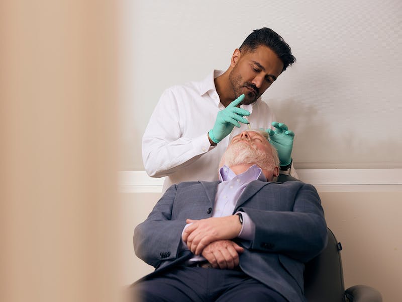 doctor helping a patient