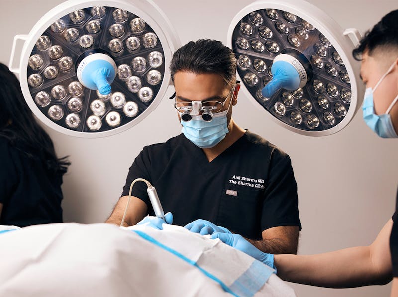 A doctor performing a surgery