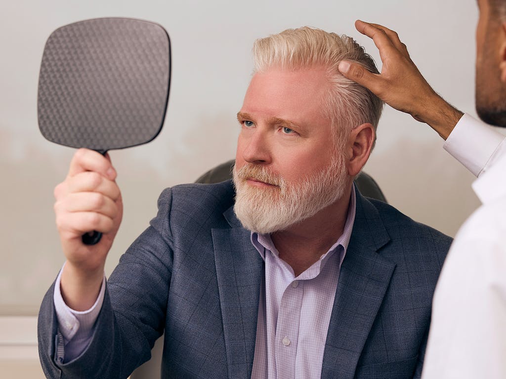 A man looking in the mirror