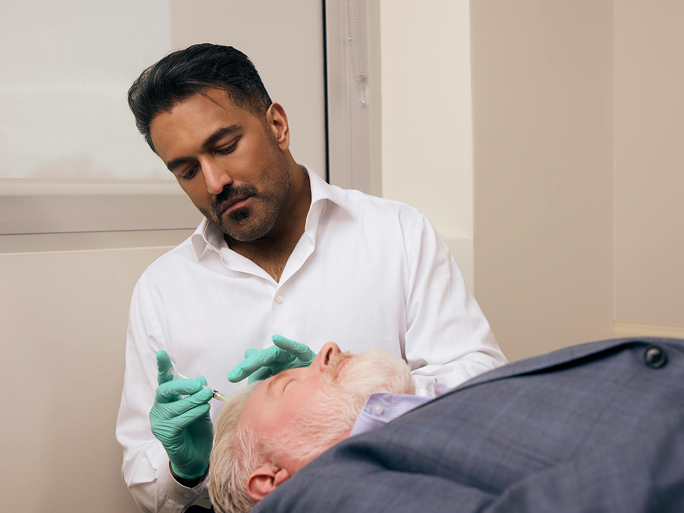 dr injecting a patient
