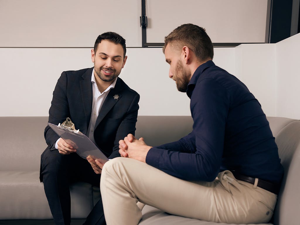 two men talking to eachother