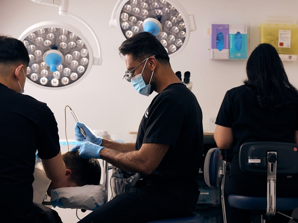 Dr. Sharma and his team performing surgery