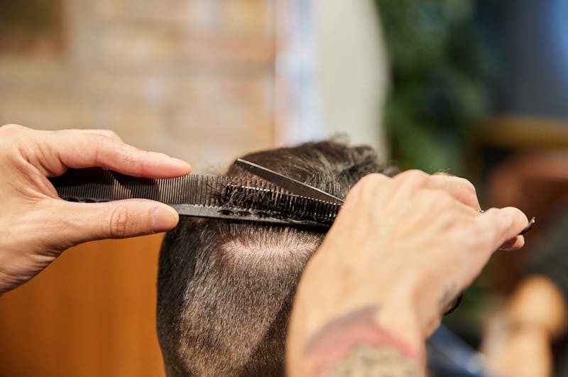 man getting a haircut