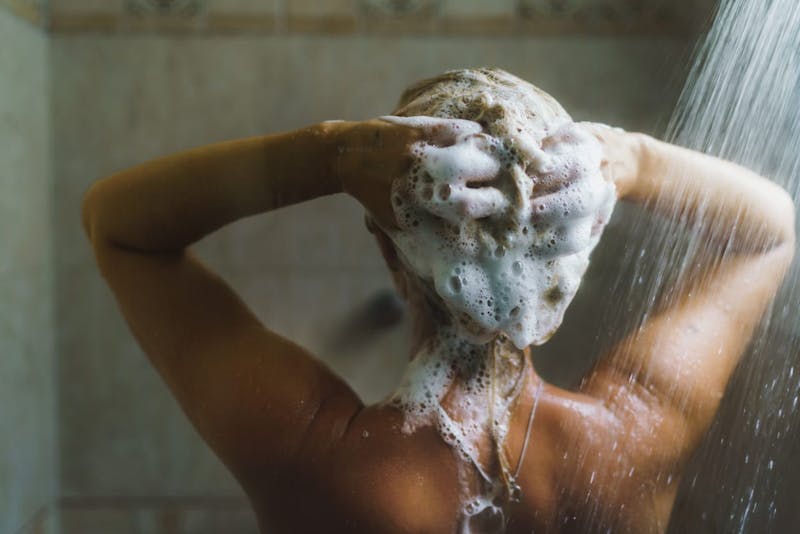 someone washing their hair