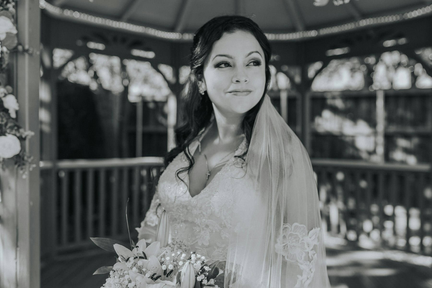 Black and white bride portrait in the gazebo at a garden wedding