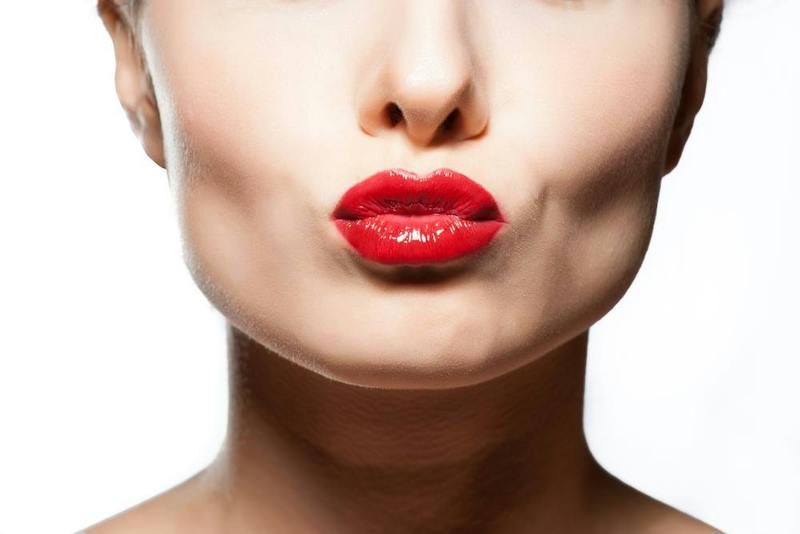 woman puckering her lips