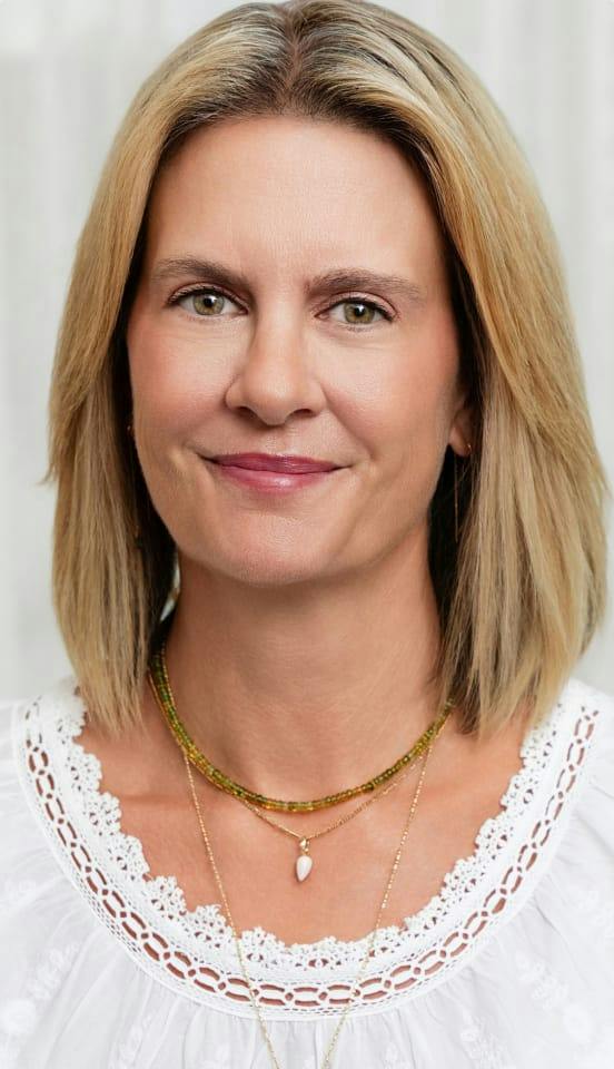 woman wearing a white top