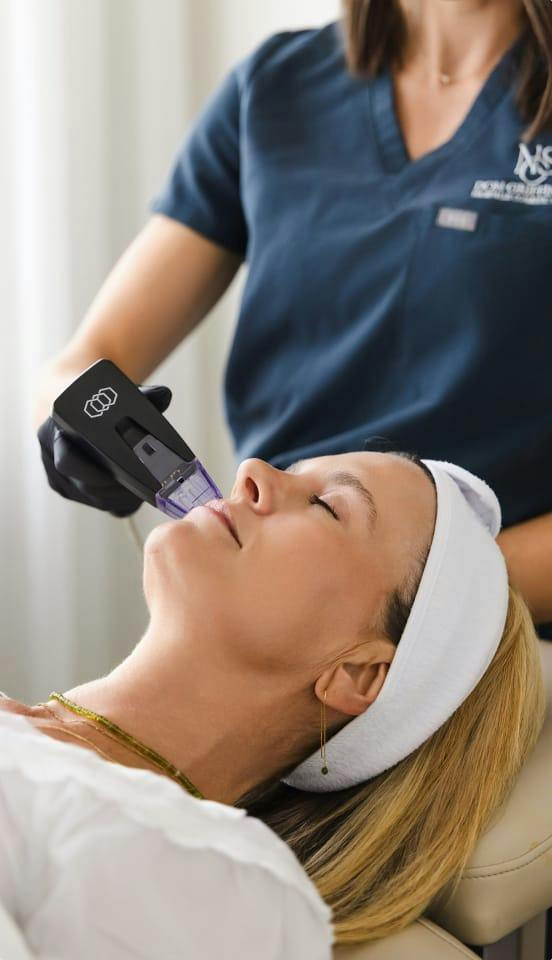 woman receiving a non-surgical treatment