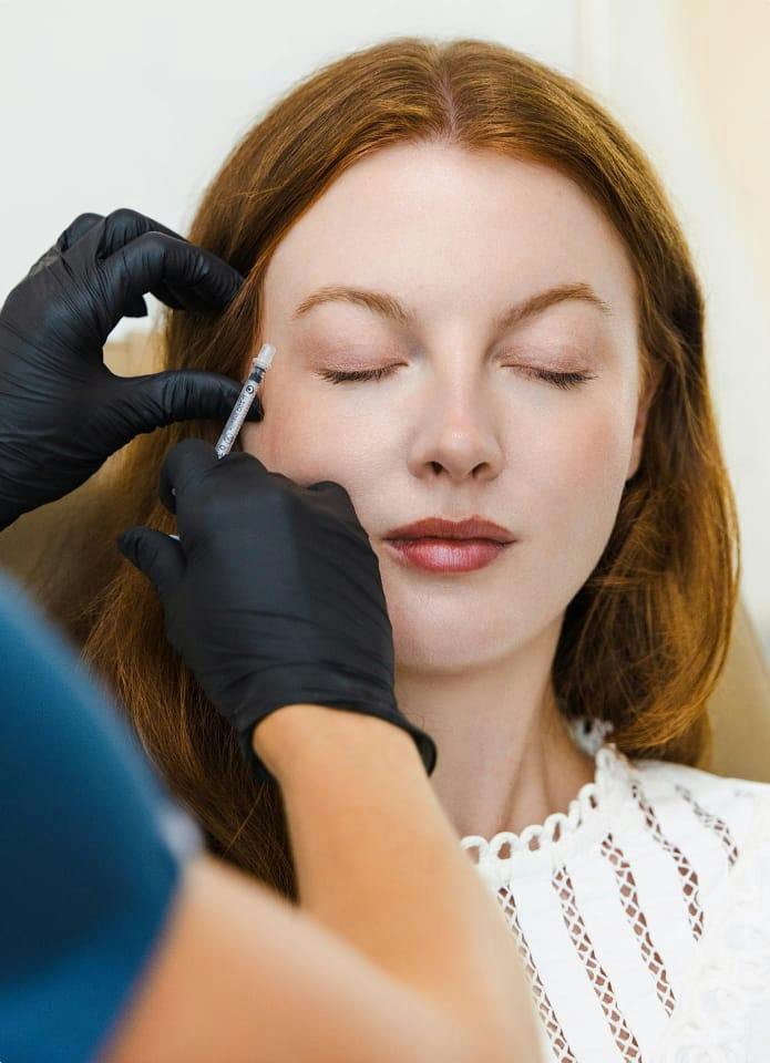 person undergoing an injectable treatment