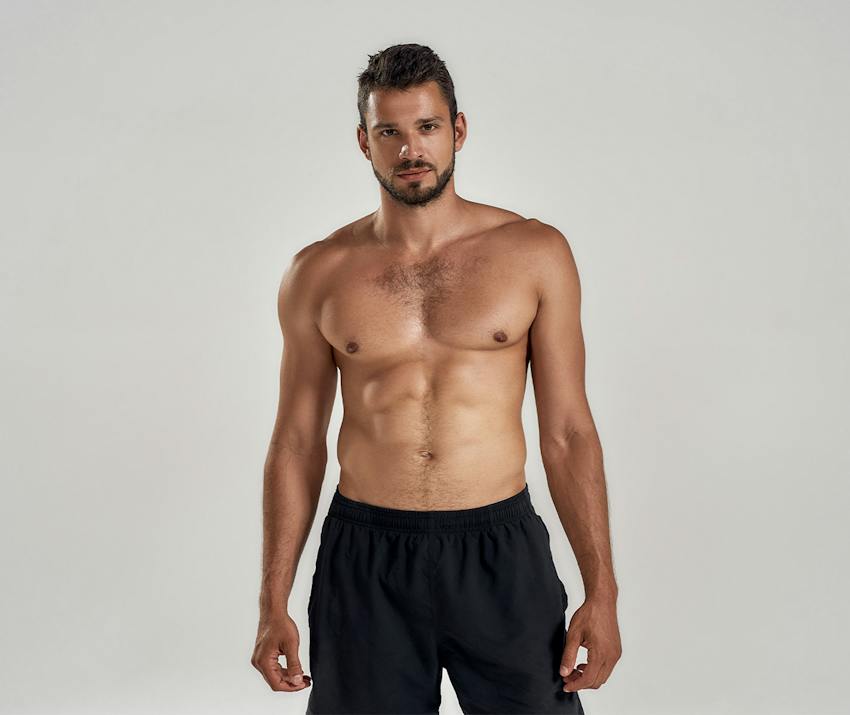 A man without a shirt on