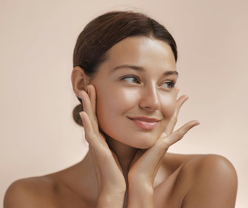 Woman touching her face