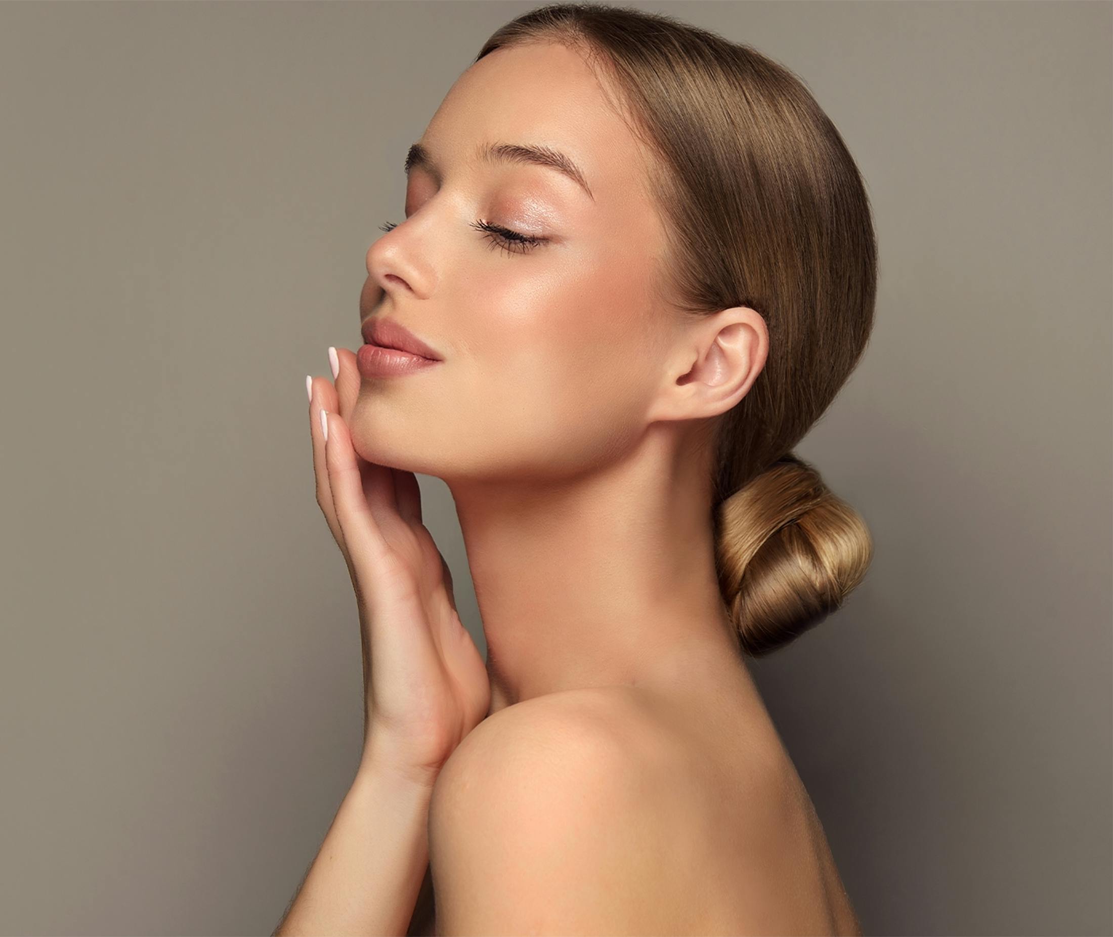 Woman touching her face