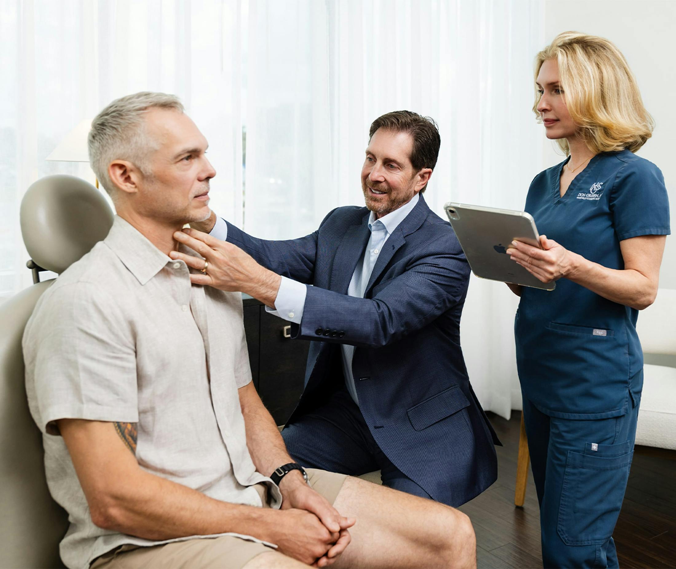 Dr. Don Griffin with a male patient