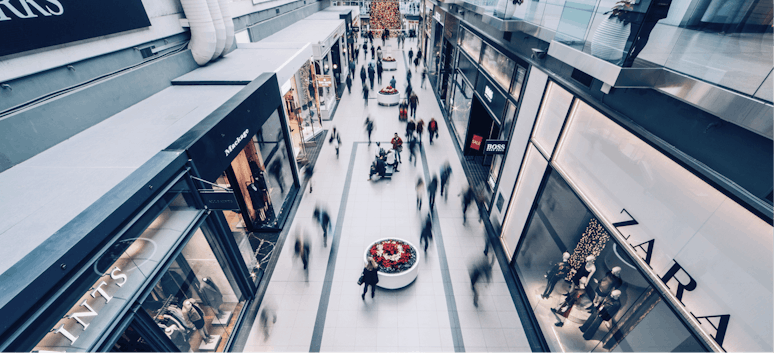 Blog hero image showing people shopping in a mall