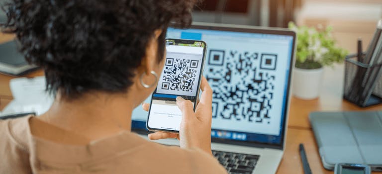 Woman scanning QR code on her phone