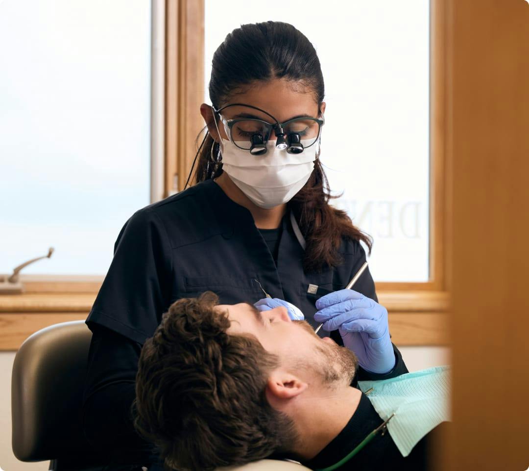 man getting a teeth cleaning