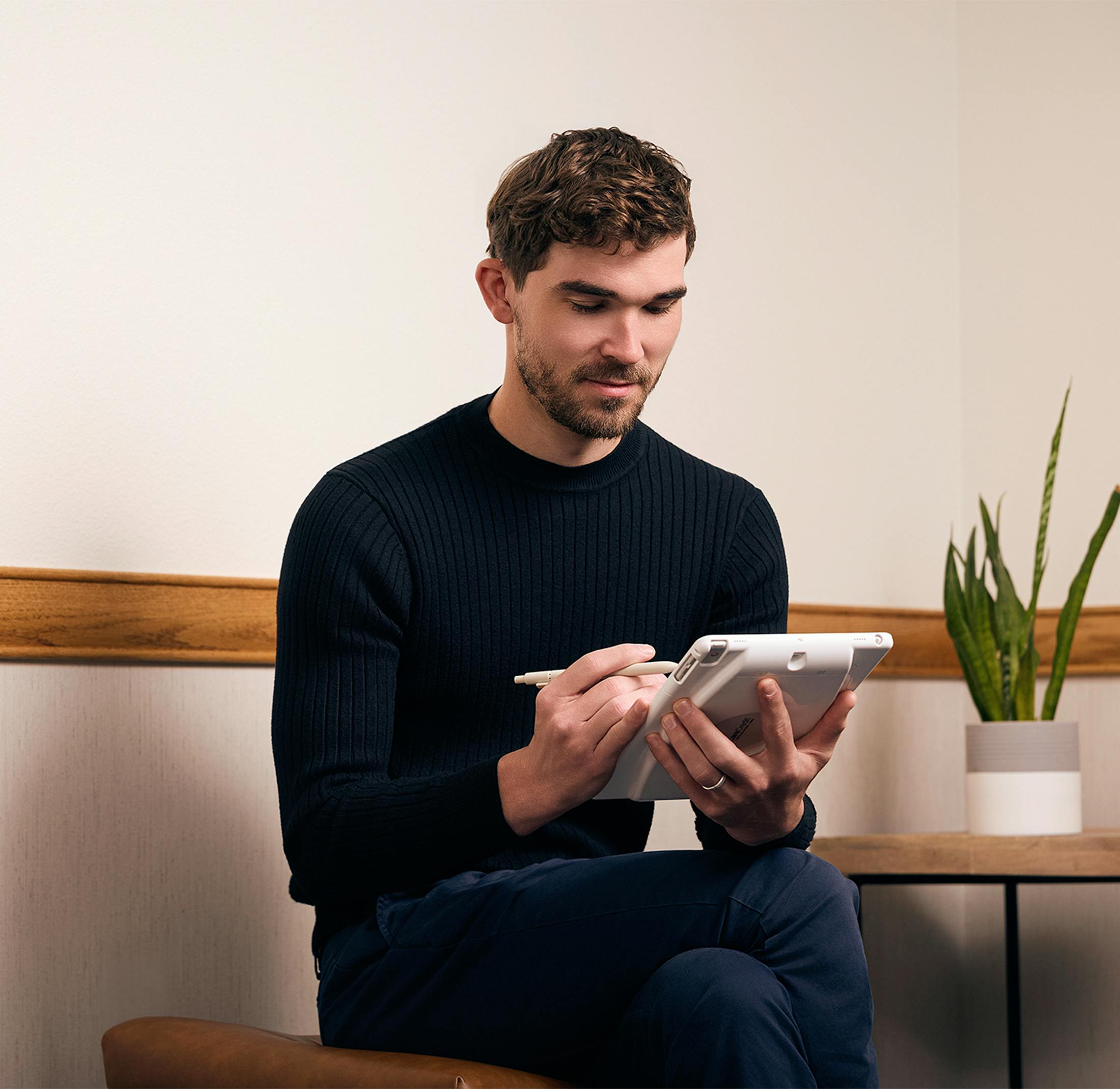 A man filling out paperwork