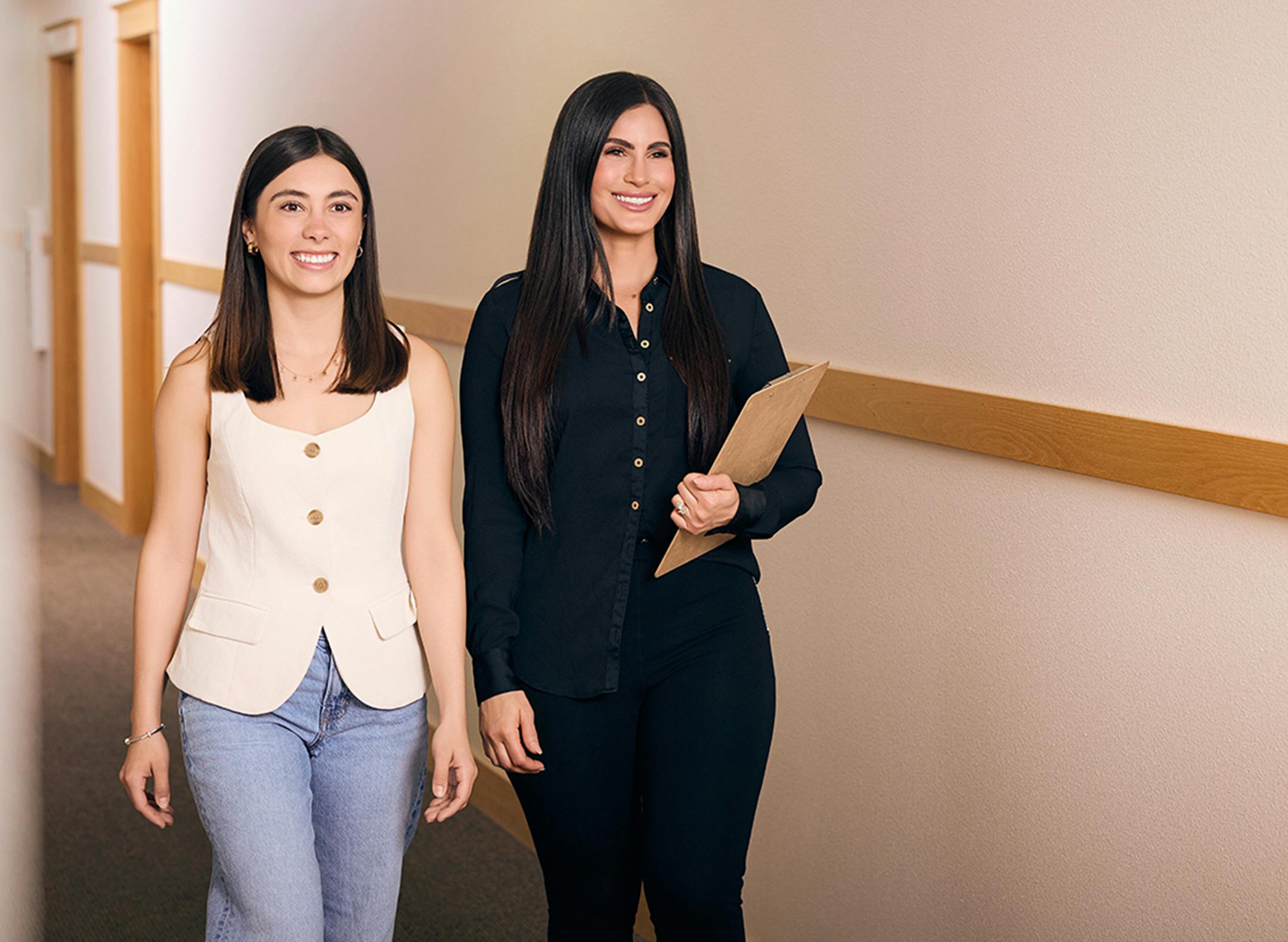 Two women smiling