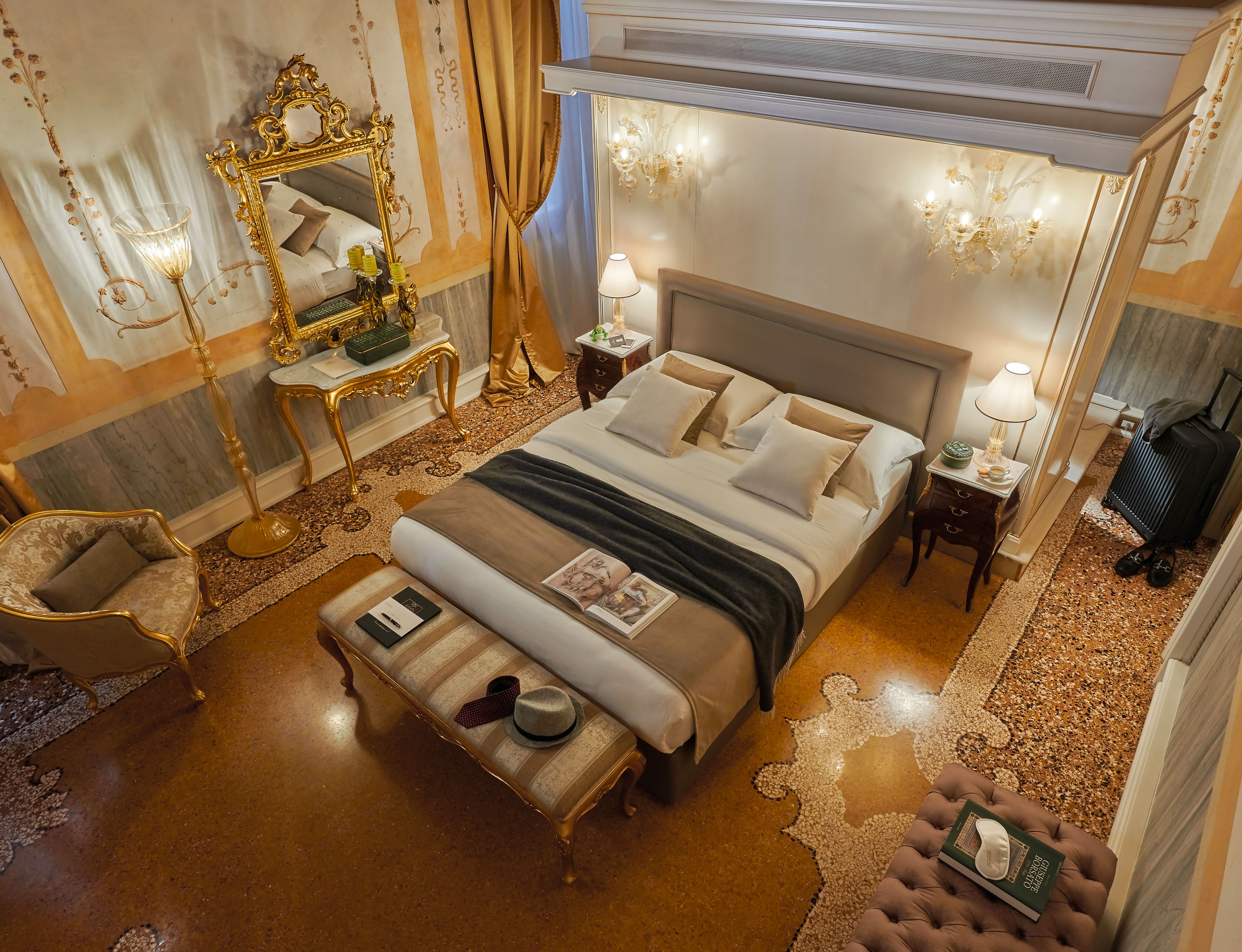 Hotel room with double bed and classic furnishings