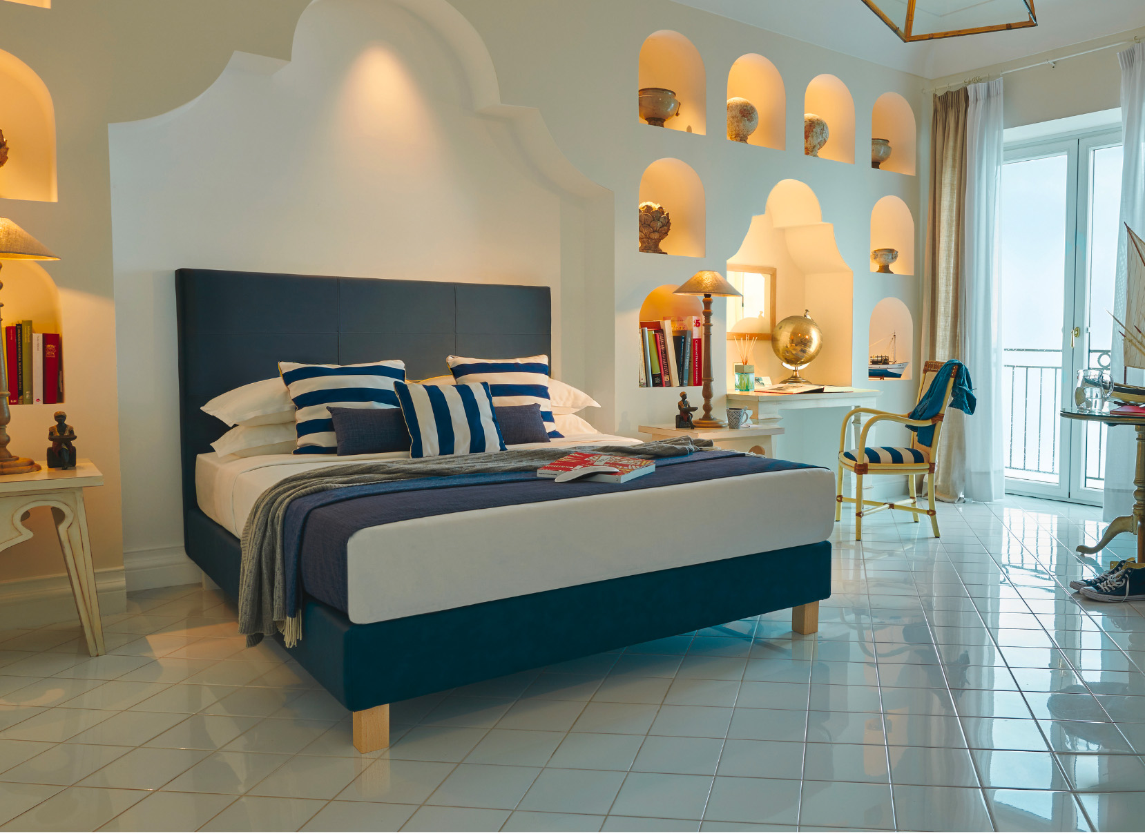 Hotel room with double bed and living area