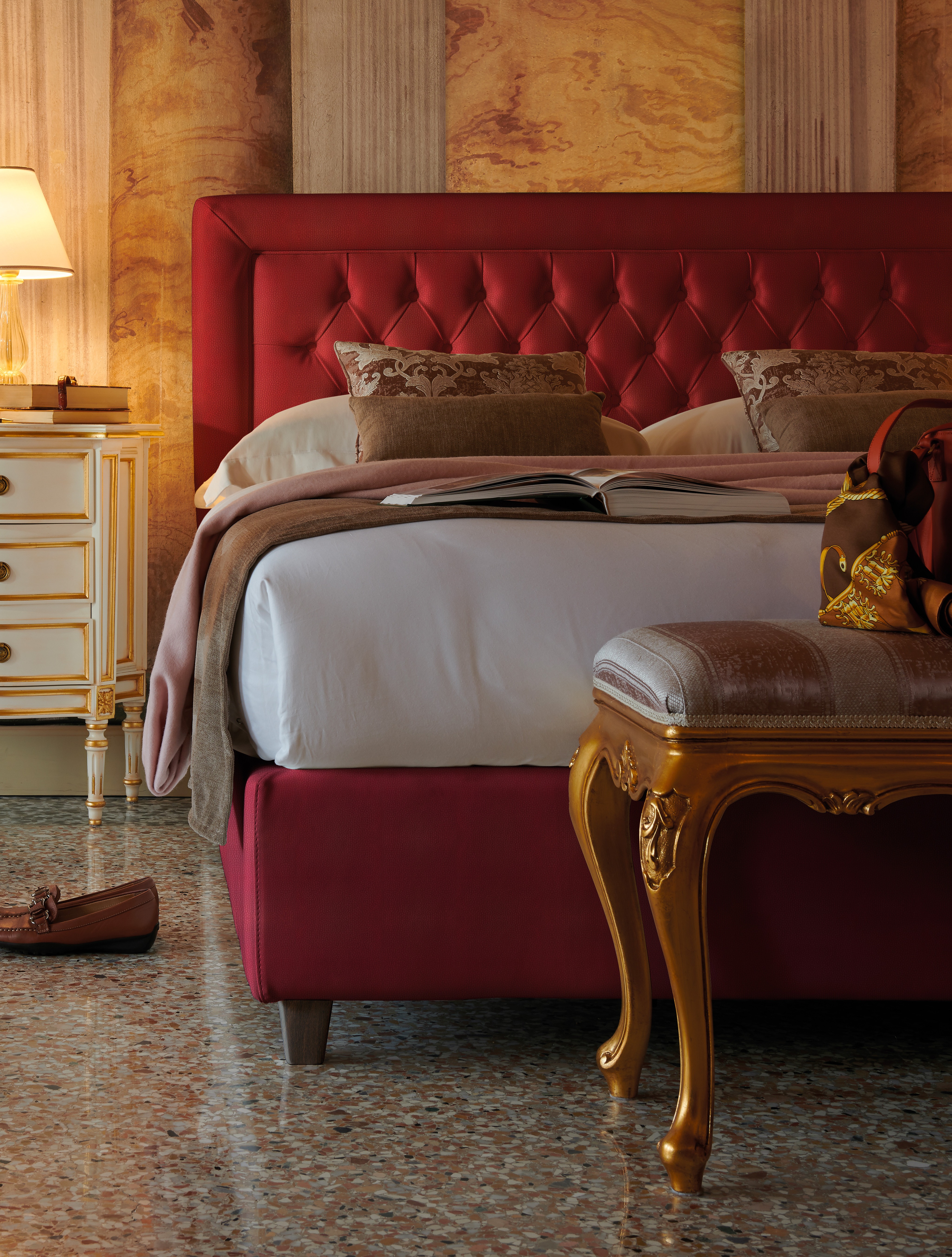 Double bed with red upholstered headboard