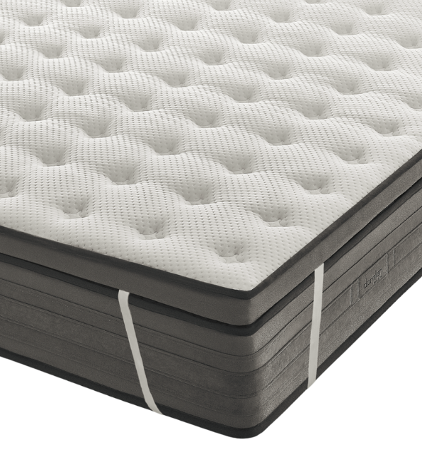 Signature topper with corner straps on a mattress
